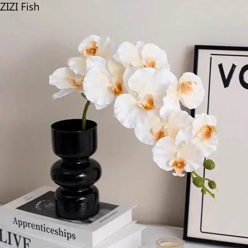 Minimalist purple & blue orchid in black glass vase living room decor