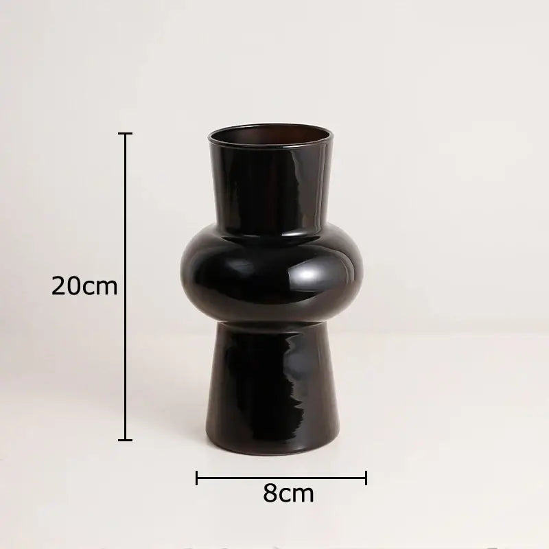 Minimalist purple & blue orchid in black glass vase living room decor