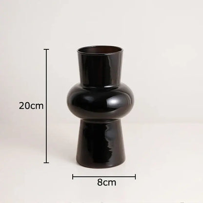 Minimalist purple & blue orchid in black glass vase living room decor
