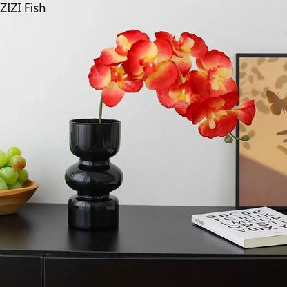 Minimalist purple & blue orchid in black glass vase living room decor