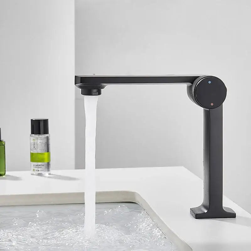 Modern black & gold basin faucet for bathroom sink with textured knob