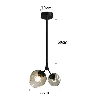 Modern black & gold wall lamps with frosted glass globes for bedroom