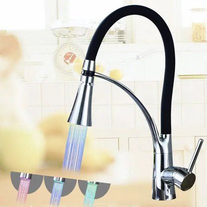 Chrome and black hose kitchen faucet with pull down sprayer
