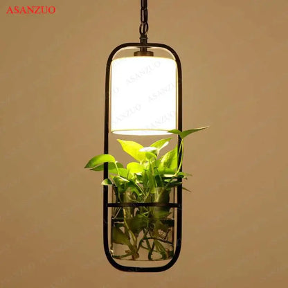 Industrial black iron cage pendant light with plant holder dining room