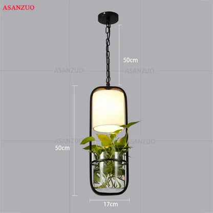 Industrial black iron cage pendant light with plant holder dining room