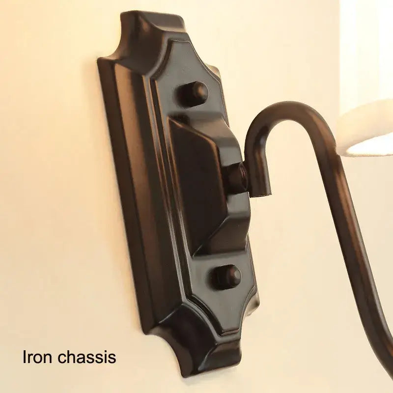 Antique bronze iron wall lamp with cream fabric shade for bedroom