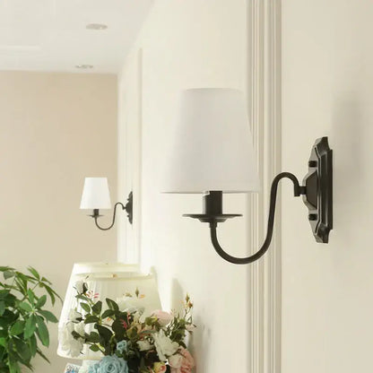 Antique bronze iron wall lamp with cream fabric shade for bedroom