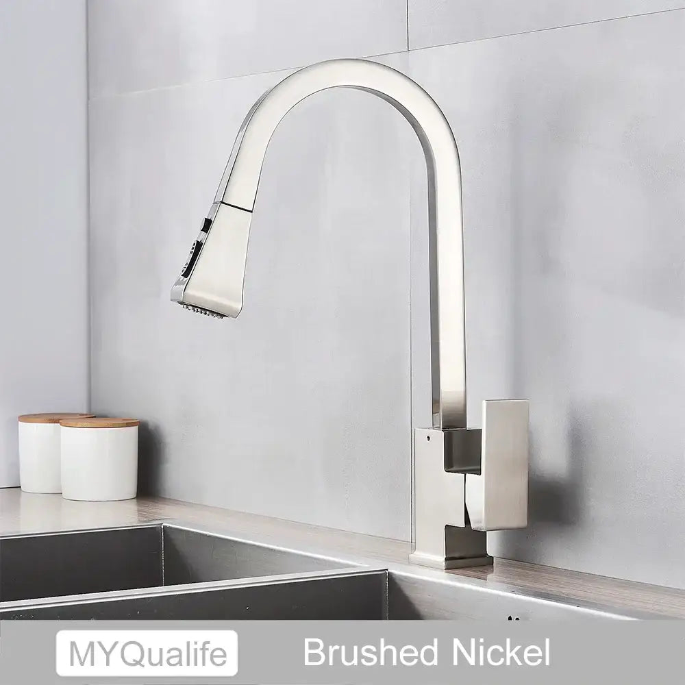 Modern black kitchen faucet with pull down spray head
