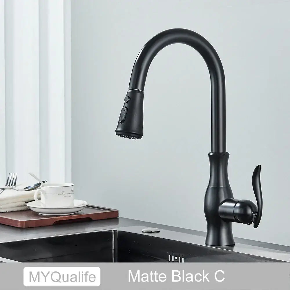 Matte black kitchen faucet with pull down spray head