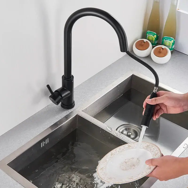 Matte black kitchen faucet with pull down spray head