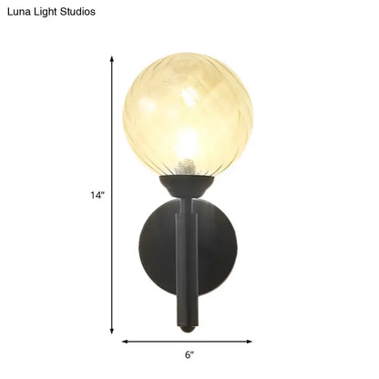 Modern black wall sconce with clear textured glass – bedroom light