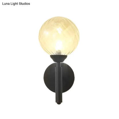 Modern black wall sconce with clear textured glass – bedroom light