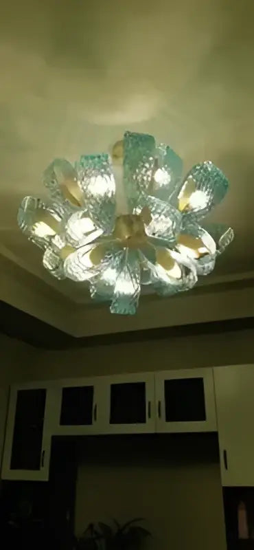 Modern blue glass led pendant lamps dining room gold petal chandelier