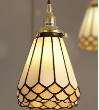 blue glass pendant light with gold lace for dining room