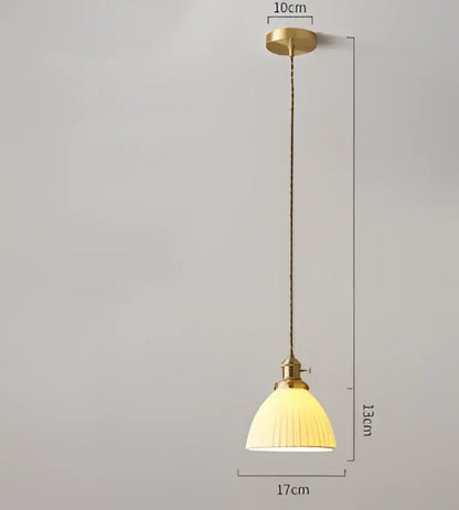 blue glass pendant light with gold lace for dining room