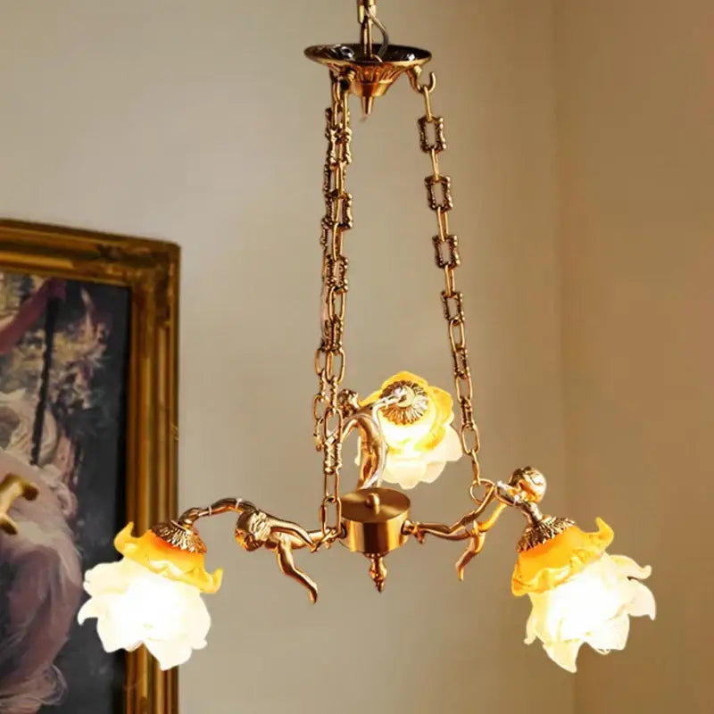 brass angel chandelier with flower glass for living room