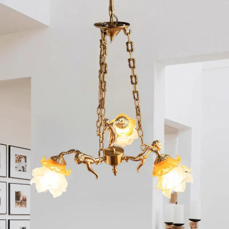 brass angel chandelier with flower glass for living room