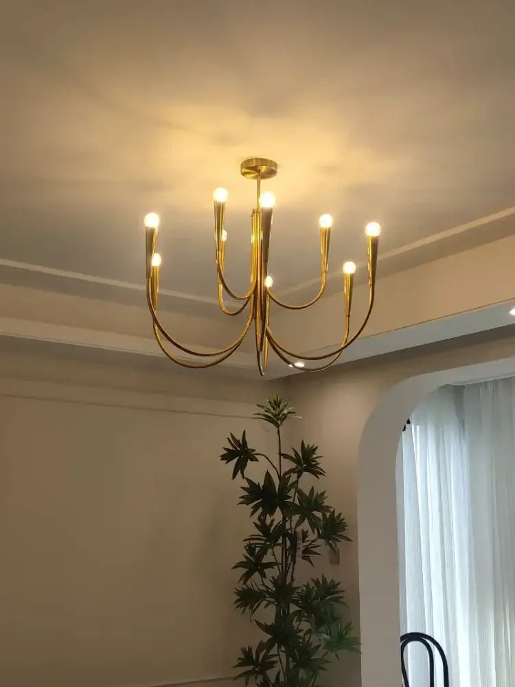brass chandelier for dining room with curved arms