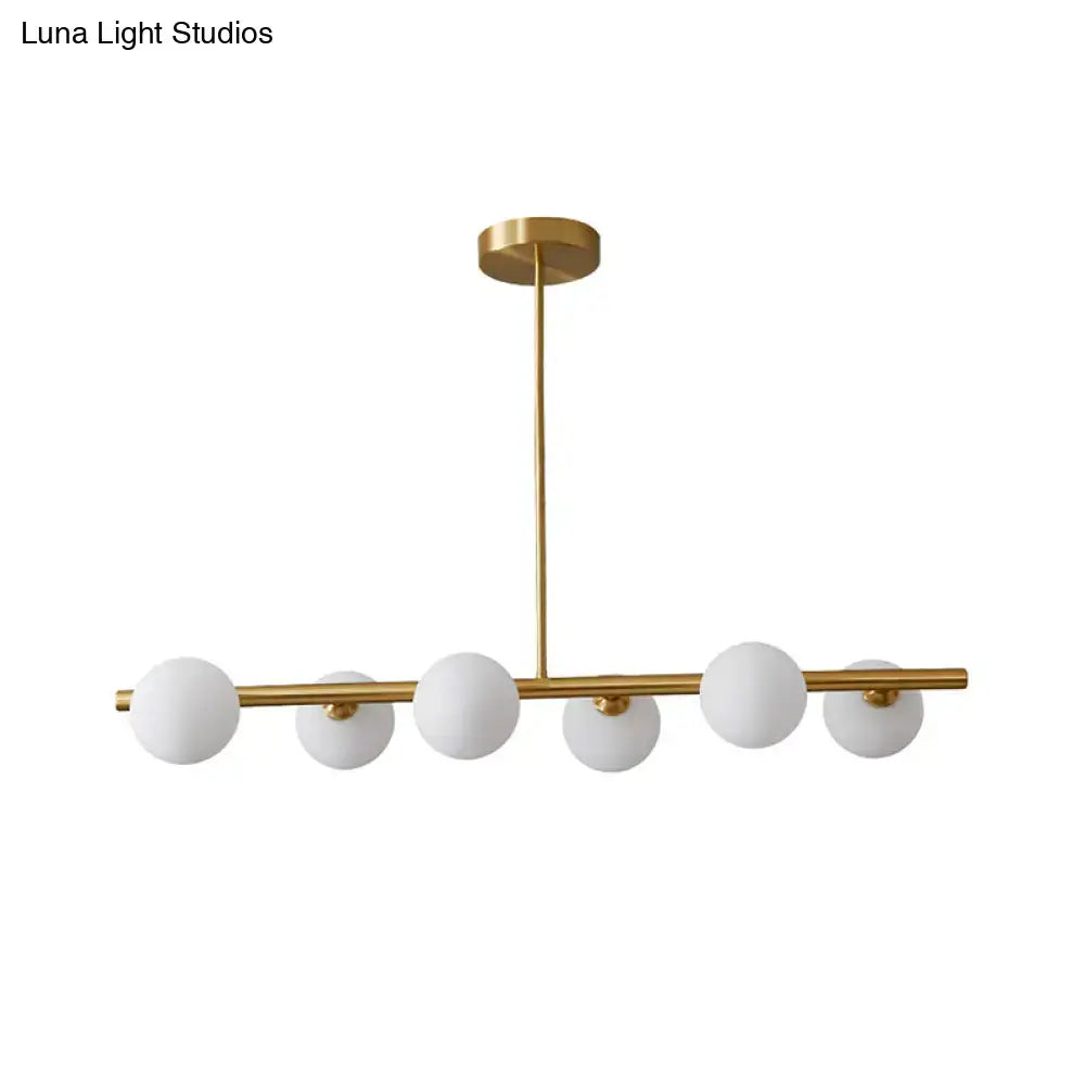 Modern brass three light globe pendant – glass dining room ceiling light