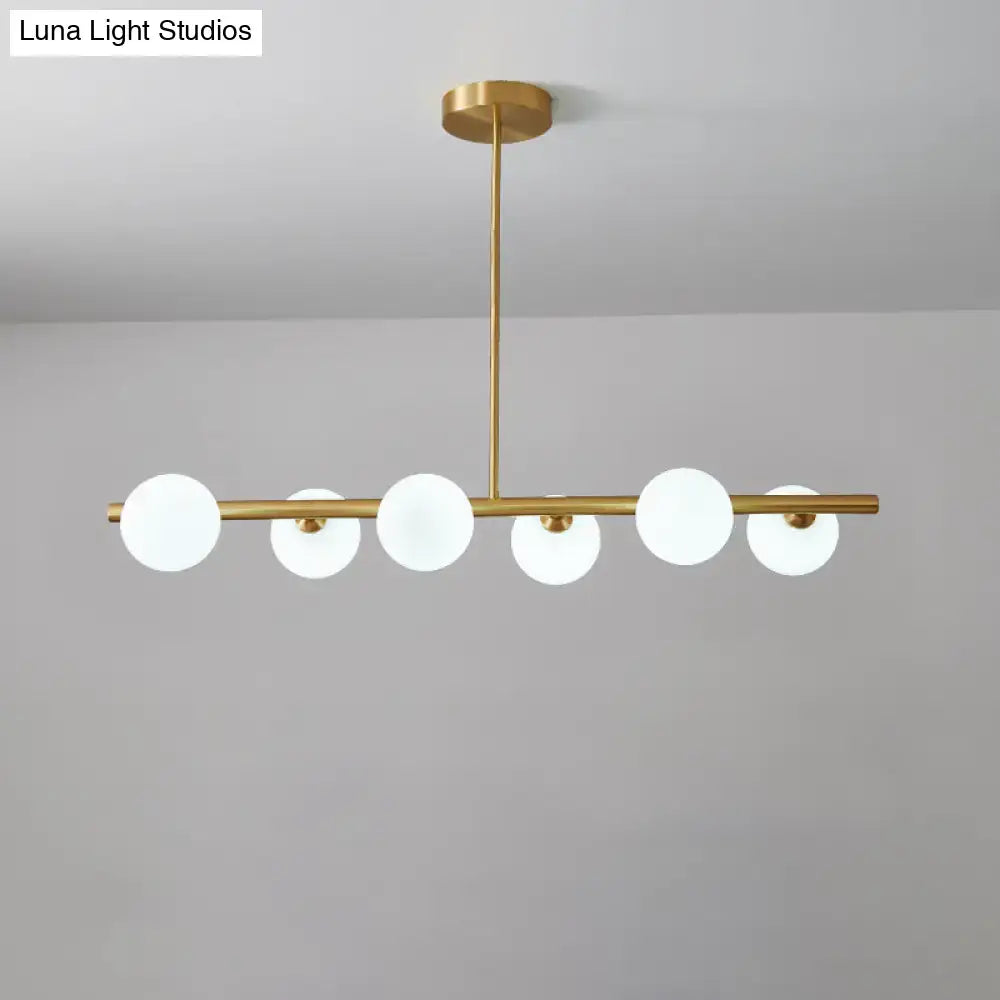 Modern brass three light globe pendant – glass dining room ceiling light