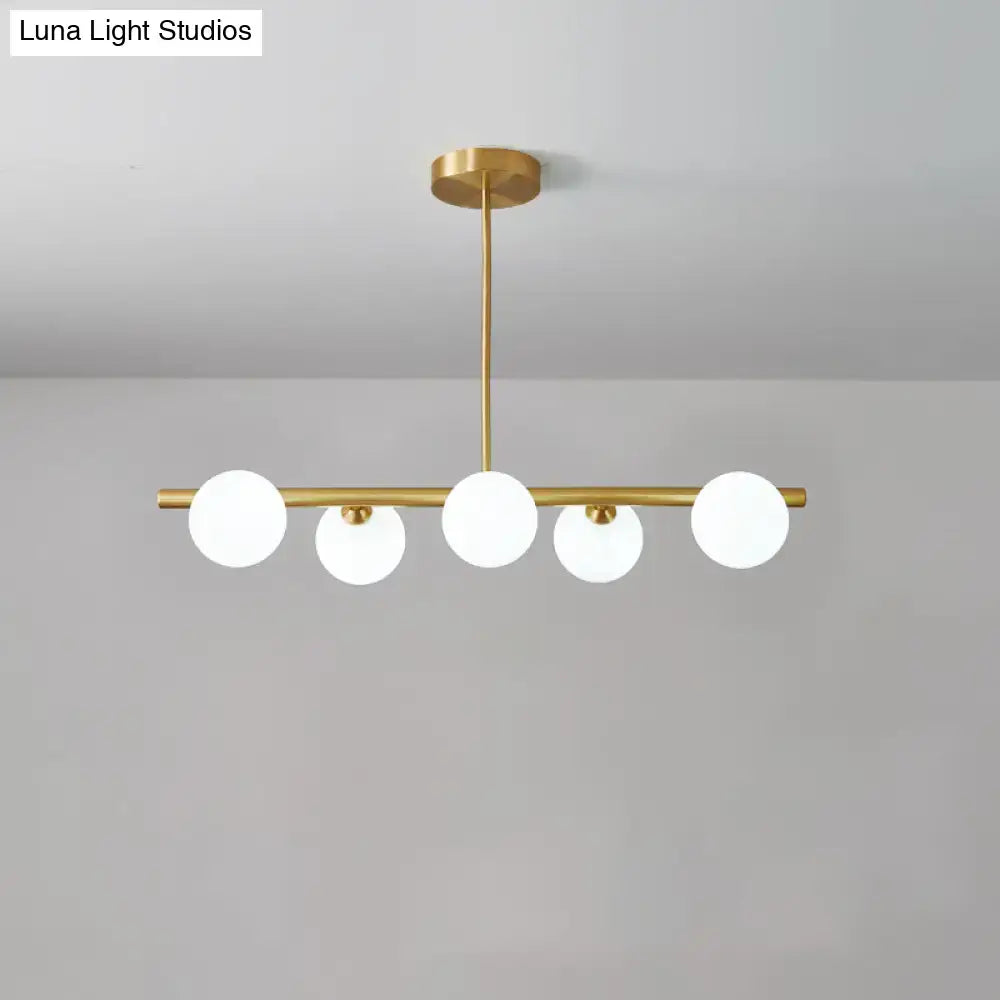 Modern brass three light globe pendant – glass dining room ceiling light