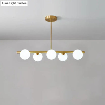 Modern brass three light globe pendant – glass dining room ceiling light