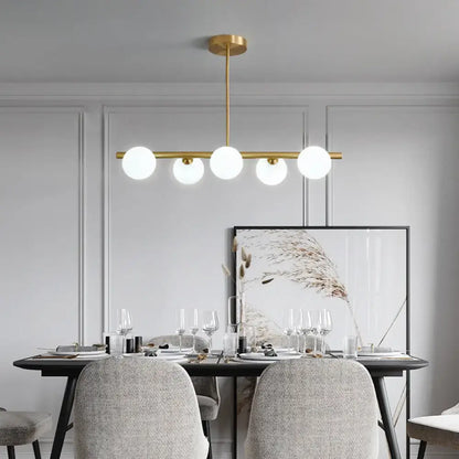 Modern brass three light globe pendant – glass dining room ceiling light