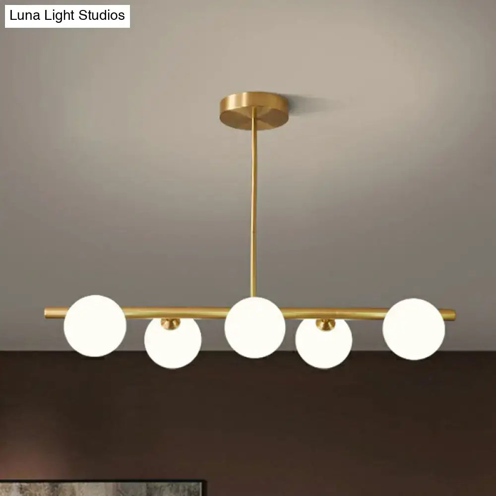Modern brass glass sphere island pendant light for dining room