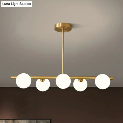 Modern brass glass sphere island pendant light for dining room
