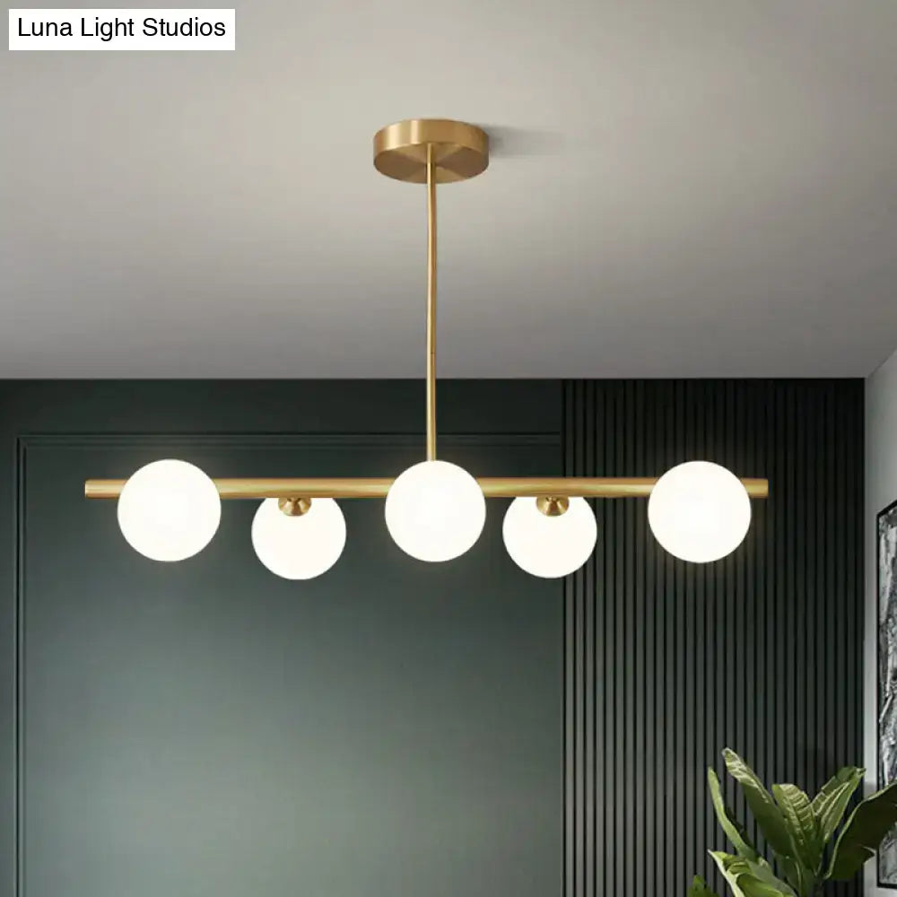 Modern brass glass sphere island pendant light for dining room