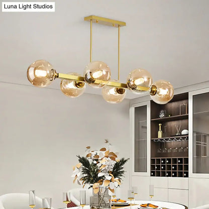 Modern black and brass globe shade pendant light for dining room