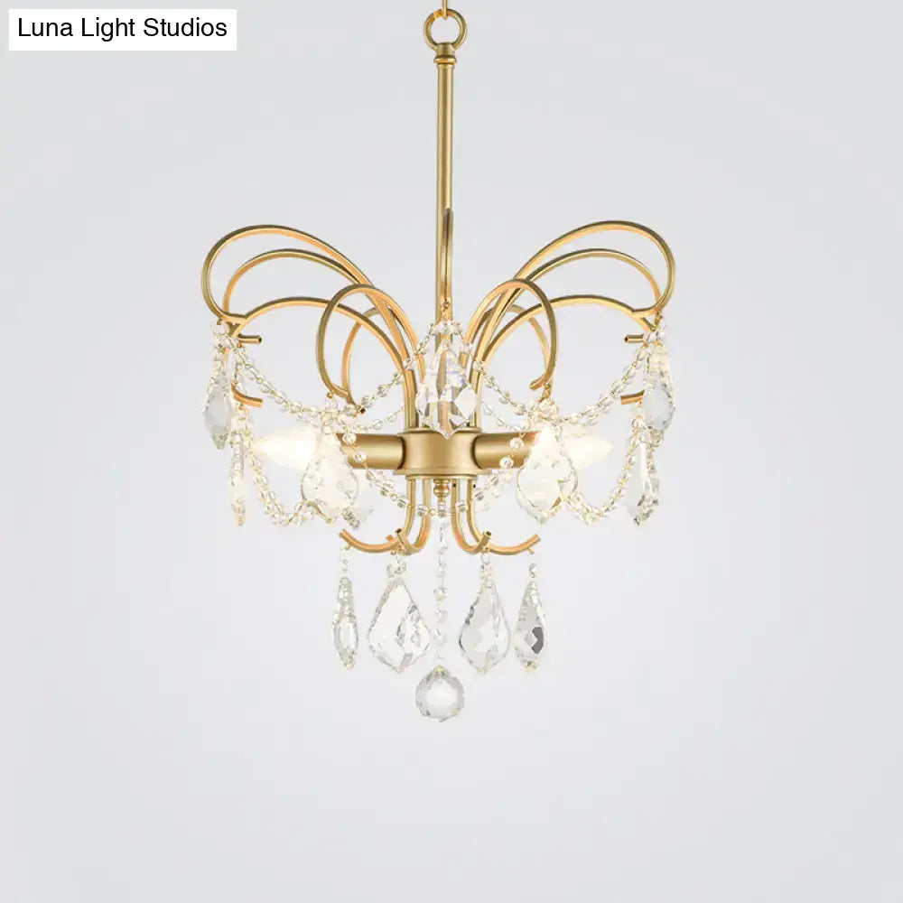 butterfly shaped gold chandelier with living room crystals