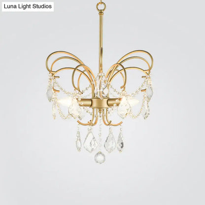 butterfly shaped gold chandelier with living room crystals