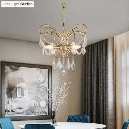 butterfly shaped gold chandelier with living room crystals