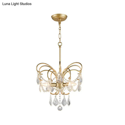 butterfly shaped gold chandelier with living room crystals