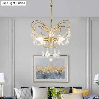 butterfly shaped gold chandelier with living room crystals