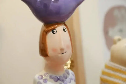 Stylized blue & purple people ceramic vase set living room decor