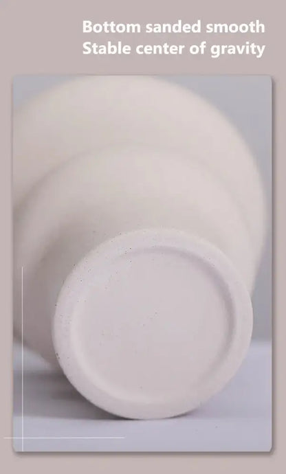Minimalist white sculpted ceramic vases for living room home decor