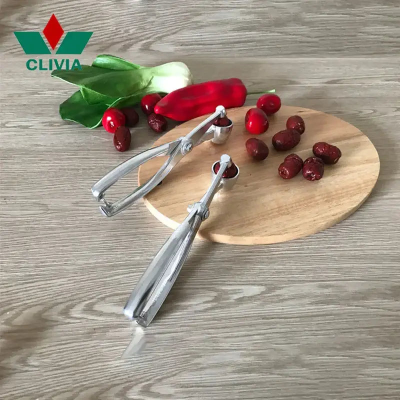 Polished silver aluminum cherry pitter kitchen seed separator