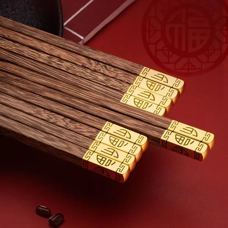 Elegant engraved gold and wood chopsticks set dining room decor
