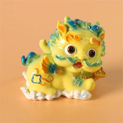 Yellow and turquoise ceramic mythology lion figurines living room decor