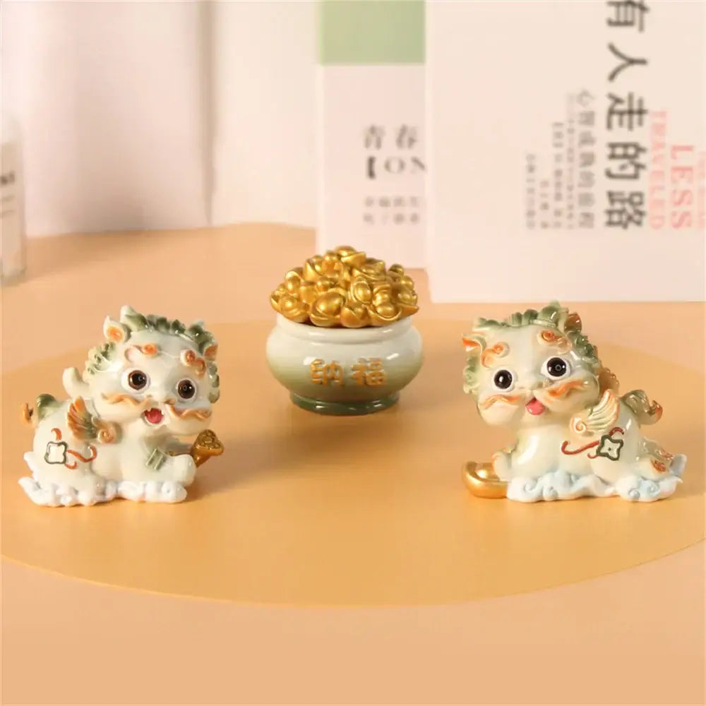 Yellow and turquoise ceramic mythology lion figurines living room decor