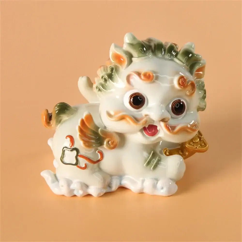 Yellow and turquoise ceramic mythology lion figurines living room decor