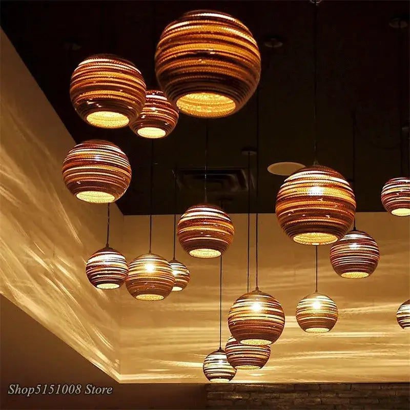 Organic warm toned paper honeycomb pendant lights living room decor