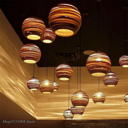Organic warm toned paper honeycomb pendant lights living room decor