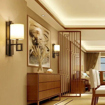Chinese style cloth wall lamp for bedroom with geometric metal frame