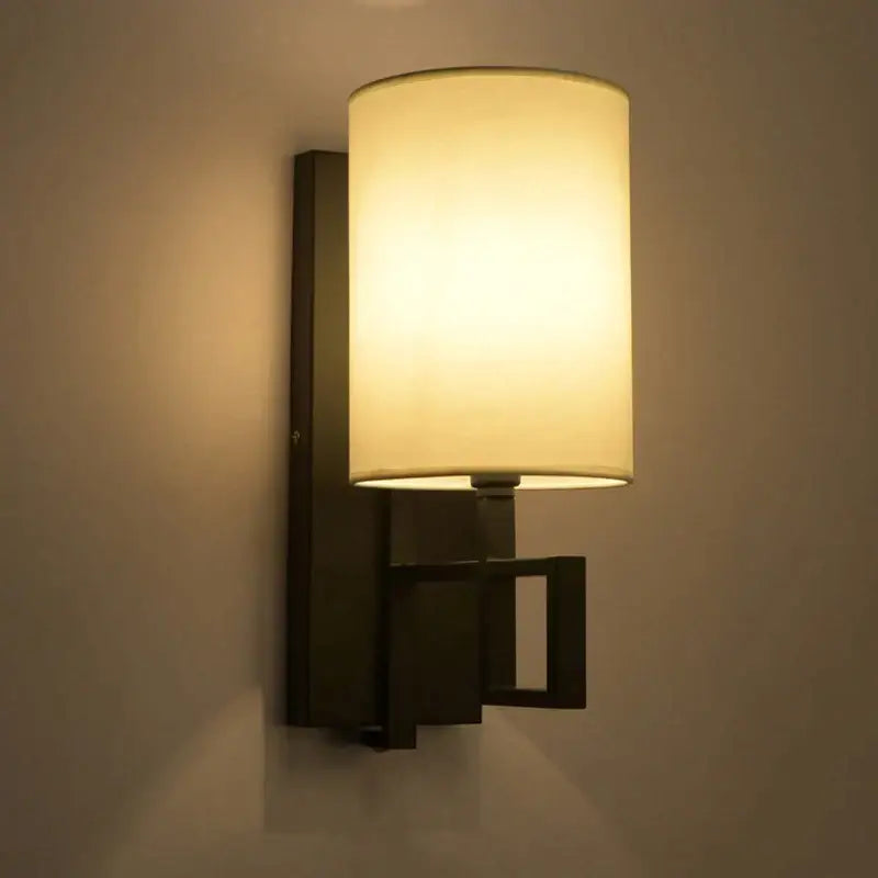 Chinese style cloth wall lamp for bedroom with geometric metal frame