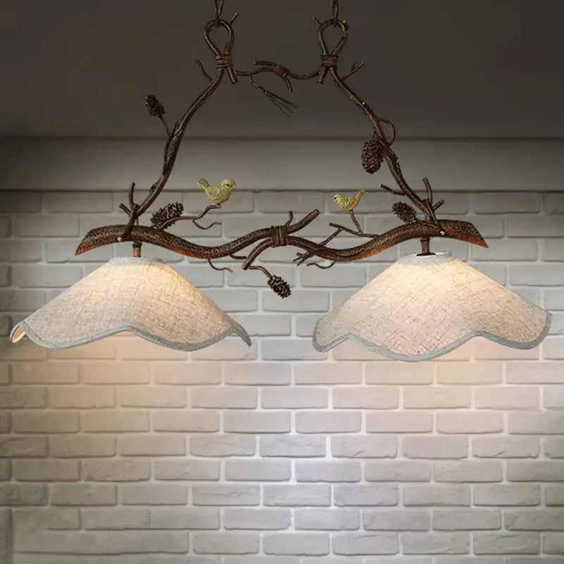 Rustic bronze branch suspension light dining room with bird accents