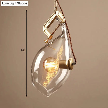 Modern brass and clear glass fish pendant light dining room
