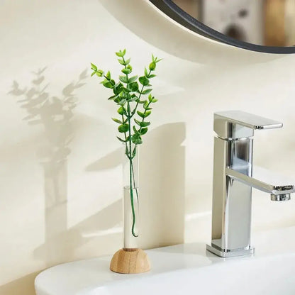 Minimalist clear glass hydroponic vase with bamboo base living room decor